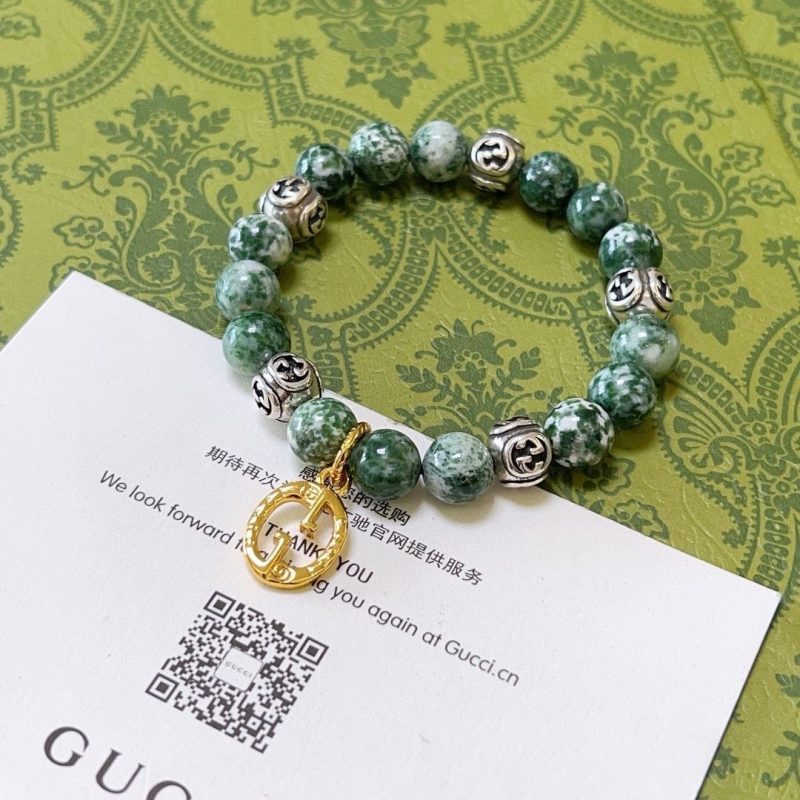 G*u*i bracelets